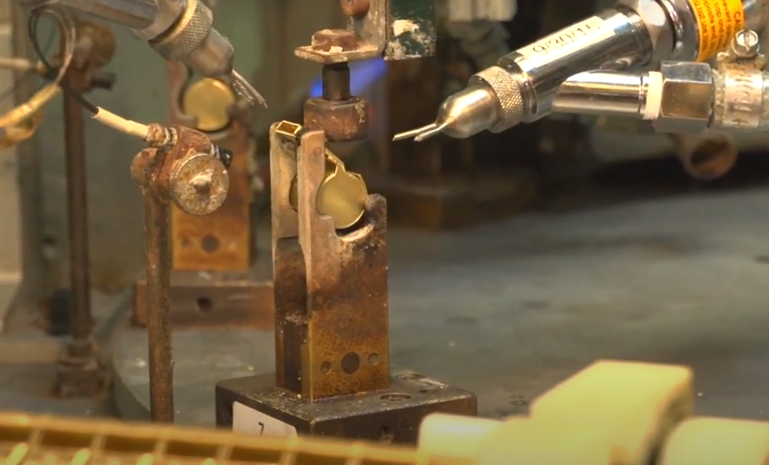 brass whistles being soldered